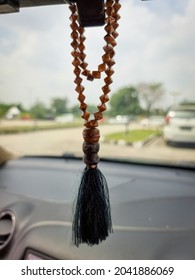 Muslim Prayer Beads Hanging In The Car