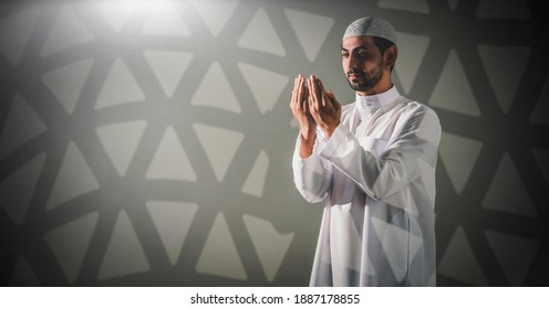muslim prayer worship and praying for allah blessing in islamic mosque. muslim standing and dua pray to allah during holy month of ramadan