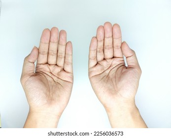 Muslim praying hands pose  top flat lay view - Shutterstock ID 2256036573