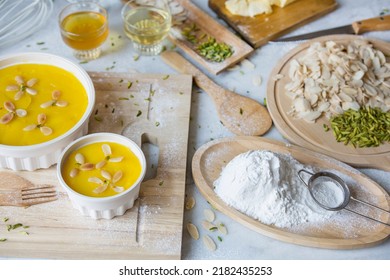 Muslim Ramadan, Sholezard Served In Iftar, Iranian Yellow Saffron Rice Pudding Dessert, Rosary, Pistachio, Rosebud, And A Cup Of Black Tea. Islamic Holy Month Greeting. Ramazan, Month Fasting Culture