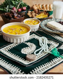 Muslim Ramadan, Sholezard Served In Iftar, Iranian Yellow Saffron Rice Pudding Dessert, Rosary, Pistachio, Rosebud, And A Cup Of Black Tea. Islamic Holy Month Greeting. Ramazan, Month Fasting Culture