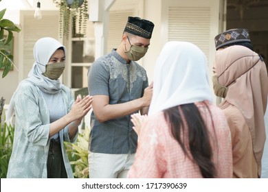 Muslim Social Distancing. Eid Mubarak During Pandemic. Family Meeting And Greeting Without Physical Touching