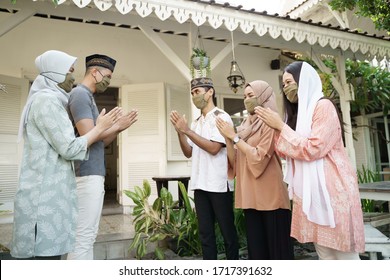 Muslim Social Distancing. Eid Mubarak During Pandemic. Family Meeting And Greeting Without Physical Touching