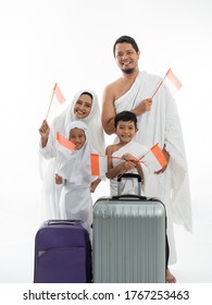 Muslim Umrah And Hajj With Family Holding Indonesian Flag