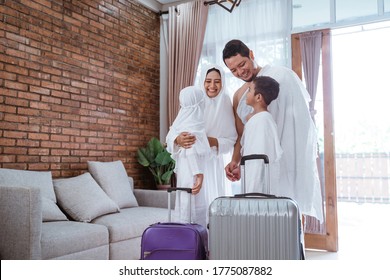 Muslim Umrah And Hajj With Family Showing Passport