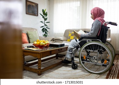 Muslim Wheelchaired Female Reading Book