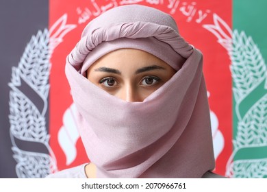 Muslim Woman Against Flag Of Afghanistan