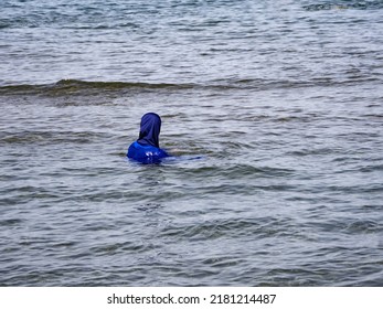 Muslim Woman Bathing In Niqab. Albania
