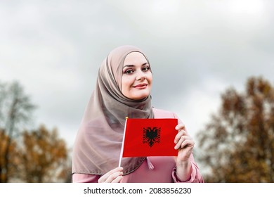 Muslim Woman In Hijab Holds Flag Of Albania 