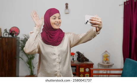 Muslim Woman in Hijab Scarf Vlogging From Phone