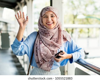 Muslim Woman Hijab Waving Hand