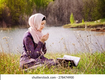 Muslim Woman Reading Holy Quran