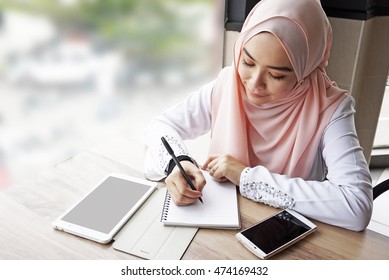 Muslim Woman Working. 