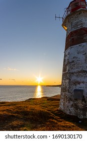 Musquash Head Lighthouse sunset in November 2019. New Brunswick Canada - Saint John region. Wide angle 