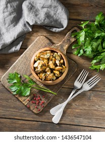 Mussel Meat On A Wooden Board On A Wooden Table. Rustic Style