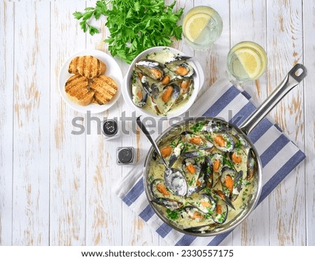 Similar – Image, Stock Photo Creamy mussels on wooden background