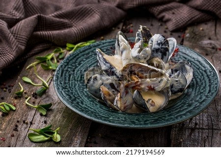 Similar – Image, Stock Photo Creamy mussels on wooden background