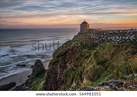 Mussenden Temple is a small circular building located on cliffs near Castlerock in County Londonderry, high above the Atlantic Ocean on the north-western coast of Northern Ireland