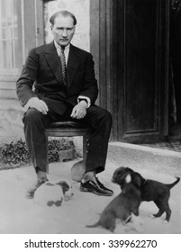 Mustafa Kemal Ataturk, President of Turkey, with his pet dogs, ca. 1930. As part of Kemal's modernization and Westernization of Turkey, he encouraged the acceptance of dogs, and the end to their relig