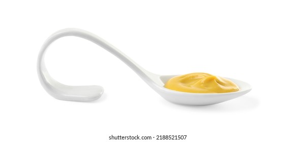 Mustard In Ceramic Serving Spoon Isolated On White