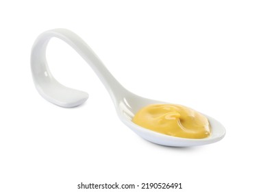 Mustard In Ceramic Serving Spoon Isolated On White