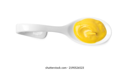 Mustard In Ceramic Serving Spoon Isolated On White, Top View