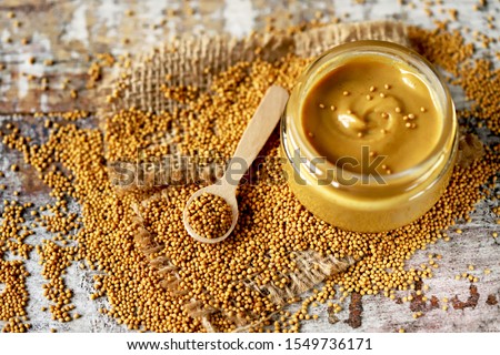Mustard in a jar. Mustard Seeds Vegan concept. Healthy diet. Selective focus. Macro.