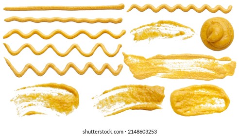 Mustard sauce in the form of lines. Collection of mustard sauce wavy lines isolated on white background.