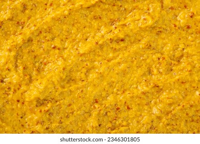 Mustard sauce with grains close-up. Hot spices as a background. Texture of Dijon mustard. - Powered by Shutterstock