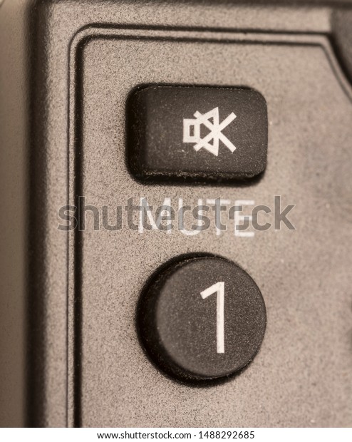 Mute botton,closeup of mute botton remote control,\
mute icon