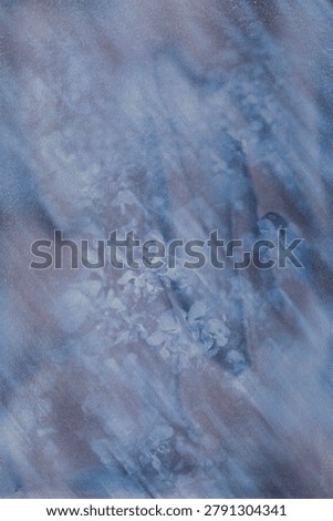 Muted blue botanical background with motion blur effect, ethereal soft focus floral shadows