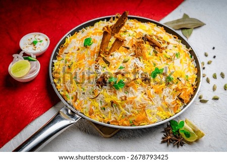 MUTTON BIRYANI
Aromatic Mutton Biryani made with tender mutton pieces, long-grain basmati rice, saffron, and a perfect blend of traditional spices, slow-cooked on dum for rich flavor.