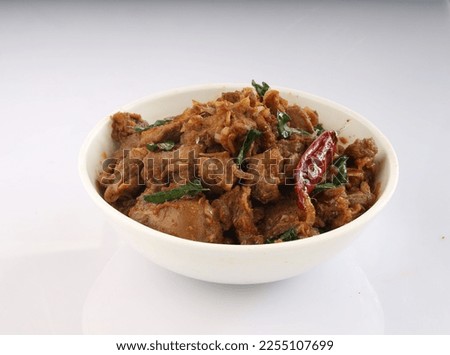 mutton chukka served in white bowl in isolated white background 