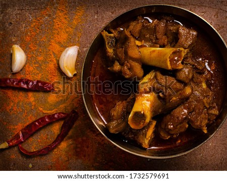 mutton kosha garnish with spices