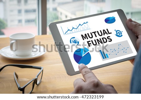MUTUAL FUNDS Computing Computer  Laptop with screen on table Silhouette and filter sun