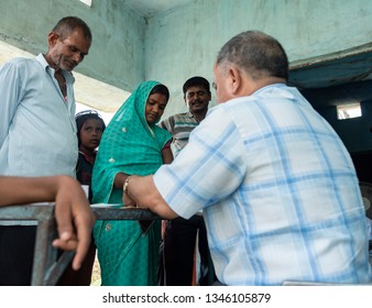 Muzaffarpur, India -  March 15, 2019: Poor people in a queue to collect medicines from a medical camp organized by Government.