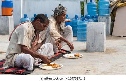 Muzaffarpur, India -  March 15, 2019: Two Poor Old Man Eating Their Food. India Has Been Ranked At The 103rd Position Among 119 Countries On The Global Hunger Index, According To A Recent Report.