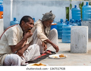 Muzaffarpur, India -  March 15, 2019: Two Poor Old Man Eating Their Food. India Has Been Ranked At The 103rd Position Among 119 Countries On The Global Hunger Index, According To A Recent Report.