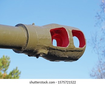 Muzzle Brake Heavy Cannon Against Blue Sky