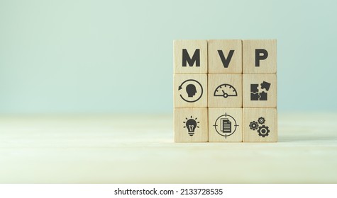 MVP, Minimum Viable Product Concept For Lean Startup. Life Cycle Of Product Development. Analysis And Market Validation. The Wooden Cubes With Abbreviation MVP And Learn, Build, Measure Icons.