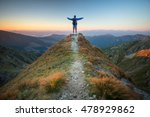 My country, my home. Man on top of mountain massif. Idyllic evening - a man on the ridge of the Low Tatras at sunset. Self Portrait in a mountain area.