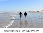 my family walking along long beach cape town 