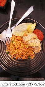 My Food Plate Served With Chinese Food Such As Momo, Fried Rice