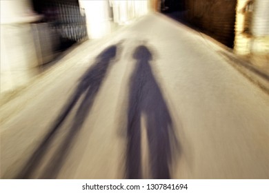 My Friend And I, Tribute To Ernst Hass, Tribute To Monet, Impressionist Photography Sweeps At Low Shutter Sweep Of  Of Shadows Of Two Persons Walking At Sunset On A Street In Toledo, Spain,