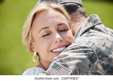 My Friends And Family Are My Support System. Shot Of A Man Returning From The Army Hugging His Wife Outside.