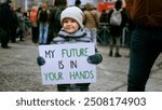 My future your hands protest banner. Cute little activist boy hold eco placard. Gen z kid demonstration. Child protester picket city street. Adult people responsible. Childhood concept Climate problem