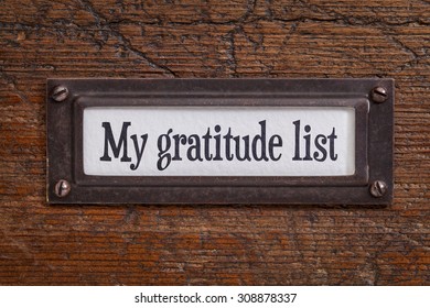 My Gratitude List - A Label On A Grunge Wooden File Cabinet