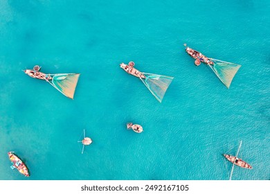 My Khe beach is a beautiful beach in Danang city , Vietnam. The sunrise is on creels, (fishing boats in Vietnam ). My Khe Beach is in Top 6 beautiful beach in the World By Forbes Magazine. - Powered by Shutterstock