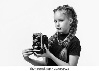 My New Camera. Cheerful Girl With Retro Look Isolated On White. Kid Vintage Fashion. Child Take Photo On Retro Camera. Beauty And Fashion. Journalist Or Reporter Photographing. Childhood Happiness