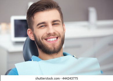 My Smile Is Perfect! Portrait Of Happy Patient In Dental Chair.